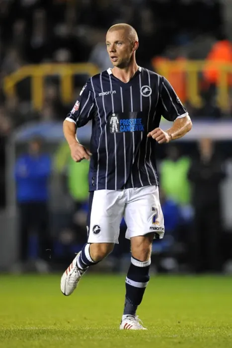 Framed Print : Millwall vs Blackpool: Sky Bet Championship Showdown at The Den - Alan Dunne in Action