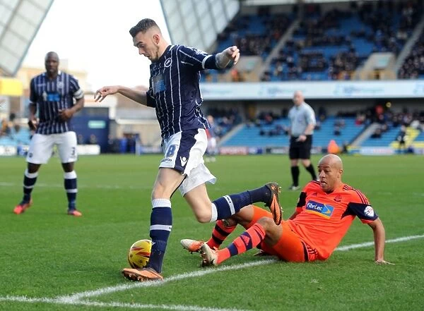 Millwall vs. Bolton Wanderers: Intense Moment between Jermaine Easter and Alex Baptiste in Sky Bet Championship Match