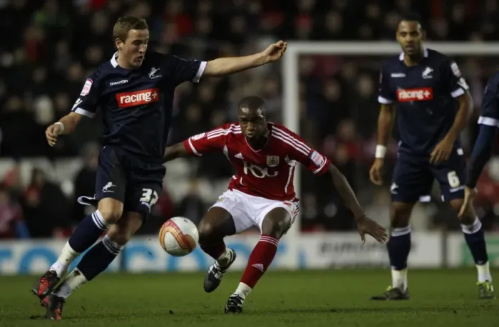 Framed Print : Millwall vs. Bristol City: Harry Kane Shields Ball Amidst Intense Championship Clash at Ashton Gate Framed Print : Millwall vs. Bristol City: Harry Kane Shields Ball Amidst Intense Championship Clash at Ashton Gate
