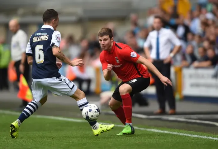 Framed Print : Millwall vs Coventry City: A Fierce Battle in Sky Bet League One at The New Den - Williams vs Stokes