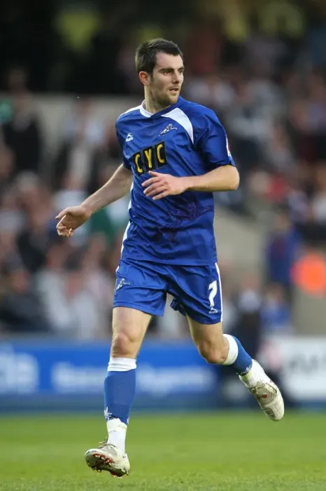 Framed Print : Millwall vs Huddersfield: Schofield's Unyielding Determination in the Intense Play-Off Semi-Final at The New Den (2010) Framed Print : Millwall vs Huddersfield: Schofield's Unyielding Determination in the Intense Play-Off Semi-Final at The New Den (2010)