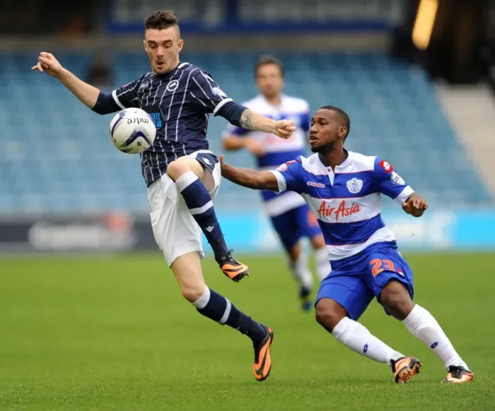 Framed Print : Millwall vs. Queens Park Rangers: Sky Bet Championship Clash at The New Den - Scott Malone and Junior Hoilett Battle It Out Framed Print : Millwall vs. Queens Park Rangers: Sky Bet Championship Clash at The New Den - Scott Malone and Junior Hoilett Battle It Out