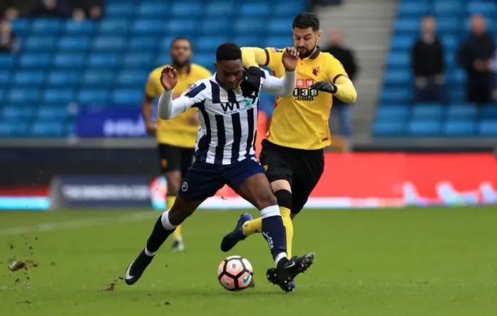 Framed Print : Millwall vs Watford in Emirates FA Cup: Onyedinma and Britos Clash for Ball at The Den