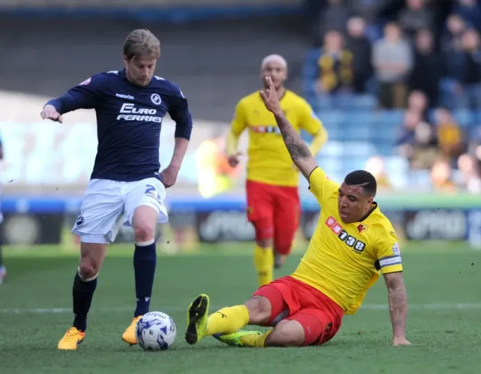 Framed Print : Millwall vs. Watford: Troy Deeney vs. Dan Harding - Intense Championship Clash at The New Den Framed Print : Millwall vs. Watford: Troy Deeney vs. Dan Harding - Intense Championship Clash at The New Den