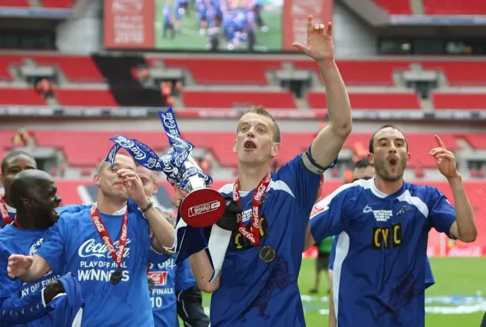 Framed Print : Millwall's Glory: The Celebration at Wembley after Winning the Football League One Play-Off Final against Swindon Town (Paul Robinson with the Trophy) Framed Print : Millwall's Glory: The Celebration at Wembley after Winning the Football League One Play-Off Final against Swindon Town (Paul Robinson with the Trophy)