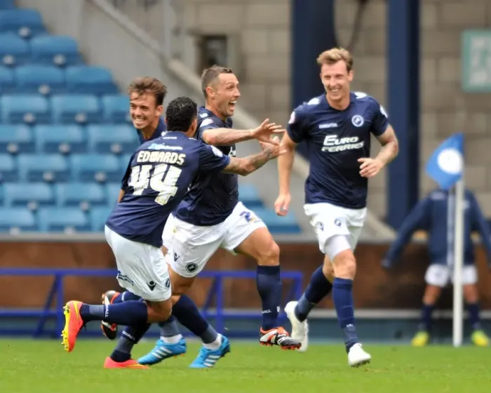 Framed Print : Millwall's Scott McDonald Scores First Goal: Celebrating with Team Mates in Sky Bet Championship Match against Blackpool at The Den Framed Print : Millwall's Scott McDonald Scores First Goal: Celebrating with Team Mates in Sky Bet Championship Match against Blackpool at The Den