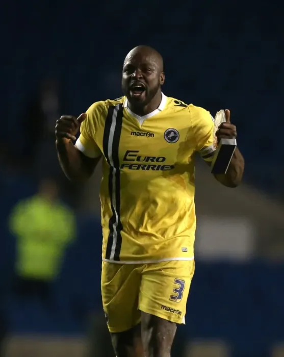 Framed Print : Millwall's Triumph: Danny Shittu Celebrates Sky Bet Championship Victory over Brighton & Hove Albion Framed Print : Millwall's Triumph: Danny Shittu Celebrates Sky Bet Championship Victory over Brighton & Hove Albion