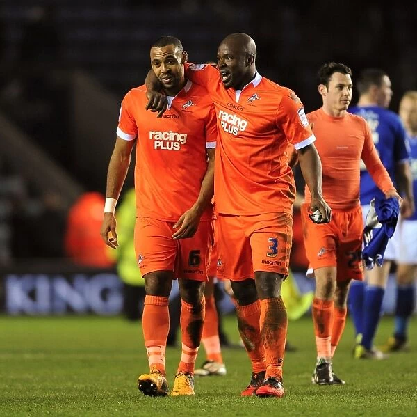 Millwall's Victory Celebration: Liam Trotter and Danny Shittu at King Power Stadium (Leicester City vs Millwall, Championship 2013)