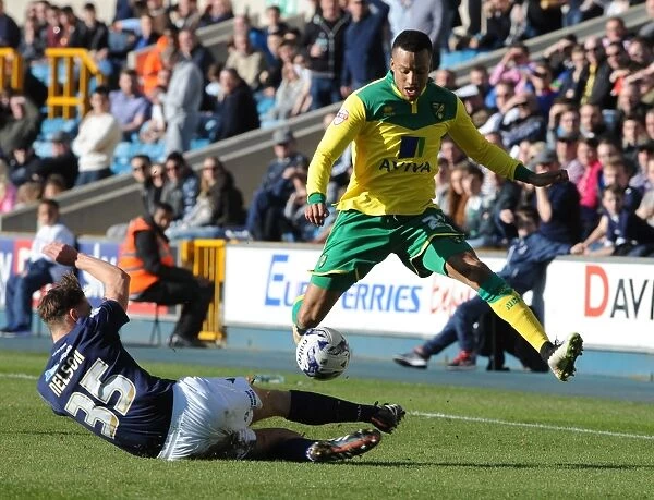 Sid Nelson vs Martin Olsson: Intense Tackle in Millwall vs Norwich City Championship Clash at The Den
