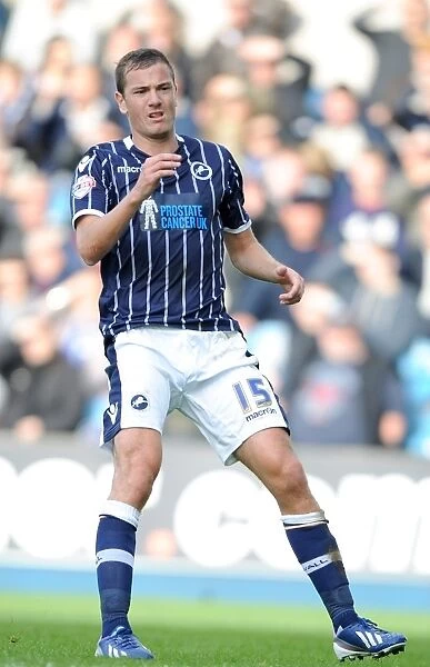 Sky Bet Championship Showdown: Millwall vs Queens Park Rangers - Paul Connolly's Action-Packed Performance at The New Den (19-10-2013)