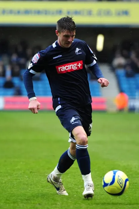 Framed Print : Unwavering Determination: Scott Barron's Epic Battle in Millwall's FA Cup Fifth Round Against Bolton Wanderers at The Den