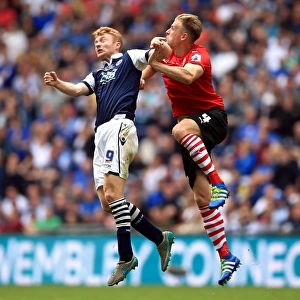 Barnsley vs Millwall - Intense Aerial Battle: Lee Gregory vs Marc Roberts - Sky Bet League One Play-Off Final at Wembley Stadium