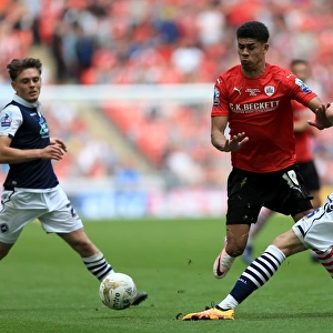 Barnsley vs. Millwall - Intense Battle for the Ball in the Sky Bet League One Play-Off Final at Wembley Stadium