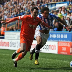 Battle for the Ball: Huddersfield Town vs. Millwall - Npower Championship Rivalry Battle for the Ball: Huddersfield Town vs. Millwall - Npower Championship Rivalry