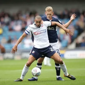 Battle for Supremacy: George Saville vs. Darren Pratley in Millwall vs. Bolton Wanderers, Sky Bet Championship Battle for Supremacy: George Saville vs. Darren Pratley in Millwall vs. Bolton Wanderers, Sky Bet Championship
