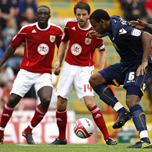 Battle for Supremacy: Liam Trotter vs. Jamal Campbell-Ryce in the Npower Championship Clash between Millwall and Bristol City (2010)