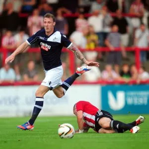 Battle for Supremacy: Woolford vs McCormack in the Pre-Season Clash between Brentford and Millwall