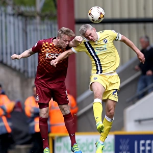 Bradford City vs Millwall: Intense Aerial Battle Between Steve Morison and Nathan Clarke in Play-Off First Leg