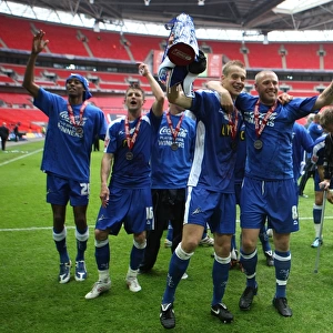 The Glorious Moment: Millwall's Paul Robinson and Gary Alexander Celebrate Promotion at Wembley (Millwall vs Swindon Town, Football League One Play Off Final)