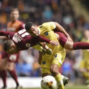 Intense Rivalry: Bradford City vs. Millwall - A Battle for the Ball in the Sky Bet League One Play-Offs Intense Rivalry: Bradford City vs. Millwall - A Battle for the Ball in the Sky Bet League One Play-Offs