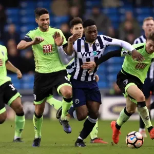 Intense Rivalry: Millwall vs. AFC Bournemouth in the Emirates FA Cup Third Round - Fred Onyedinma and Andrew Surman Clash for Possession Intense Rivalry: Millwall vs. AFC Bournemouth in the Emirates FA Cup Third Round - Fred Onyedinma and Andrew Surman Clash for Possession