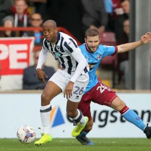 Intense Rivalry: Nadjim Abdou vs. Jamie Ness in the Sky Bet League One Playoff Semi-Final Clash at Scunthorpe United