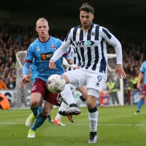 Intense Rivalry: Neil Bishop vs. Lee Gregory in the Sky Bet League One Playoff Semi-Final Clash between Scunthorpe United and Millwall