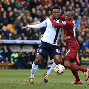 Mahlon Romeo vs Kyel Reid: Intense Battle for the Ball in Millwall's Sky Bet League One Clash with Bradford City