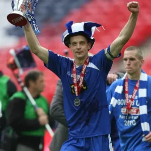 Millwall FC's Glory: Celebrating Promotion to Championship with Football League One Play-Off Trophy at Wembley - The Unforgettable Moment of Triumph (Paul Robinson's Emotional Victory)