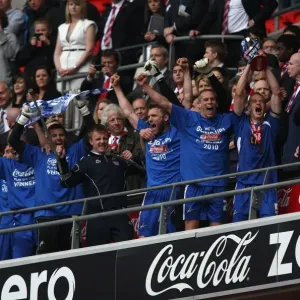 Millwall FC's Promotion to League One: Celebrating at Wembley with Paul Robinson and the Trophy Millwall FC's Promotion to League One: Celebrating at Wembley with Paul Robinson and the Trophy