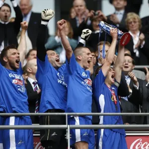 Millwall Football Club Celebrate Promotion to League One with Play-Off Final Win at Wembley (The Trophy Lift) Millwall Football Club Celebrate Promotion to League One with Play-Off Final Win at Wembley (The Trophy Lift)