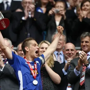 Millwall Football Club: Celebrating Championship at Wembley - The Presentation: John Berylson and Paul Robinson with the League One Play Off Trophy Millwall Football Club: Celebrating Championship at Wembley - The Presentation: John Berylson and Paul Robinson with the League One Play Off Trophy