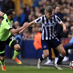 Millwall vs AFC Bournemouth: Emirates FA Cup Third Round Clash at The Den - Intense Battle for the Ball Millwall vs AFC Bournemouth: Emirates FA Cup Third Round Clash at The Den - Intense Battle for the Ball