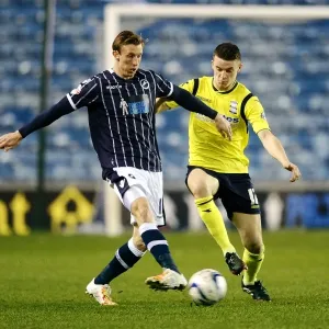 Millwall vs Birmingham City: A Championship Showdown - Woolford Clears the Threat at The Den