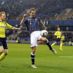 Millwall vs Birmingham City: Robinson Clears the Threat at The Den (Sky Bet Championship)