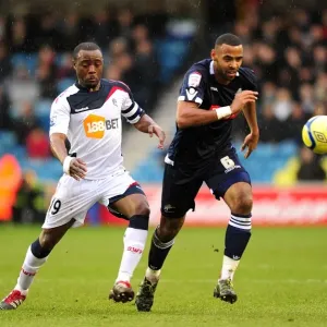 Millwall vs. Bolton Wanderers: Fifth Round FA Cup Clash - Intense Battle Between Nigel Reo-Coker and Liam Trotter Millwall vs. Bolton Wanderers: Fifth Round FA Cup Clash - Intense Battle Between Nigel Reo-Coker and Liam Trotter