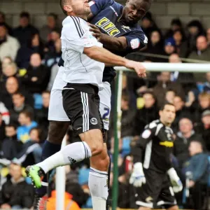 Millwall vs. Derby County: A Championship Battle - Shittu vs. Kuqi at The New Den