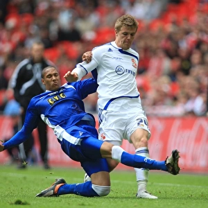 Millwall vs Swindon: Intense Battle for the Ball in the League One Play-Off Final at Wembley Stadium