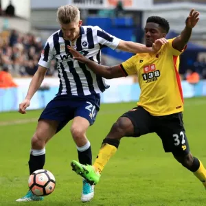 Millwall vs. Watford: Intense Battle for the Ball in FA Cup Fourth Round at The Den Millwall vs. Watford: Intense Battle for the Ball in FA Cup Fourth Round at The Den