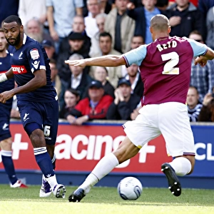 Millwall vs. West Ham United: Liam Trotter vs. Winston Reid in the Npower Championship Clash at The Den