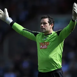 Millwall's David Forde Saves Huddersfield Town's Penalty in Championship Clash at John Smith's Stadium (20-04-2013) Millwall's David Forde Saves Huddersfield Town's Penalty in Championship Clash at John Smith's Stadium (20-04-2013)