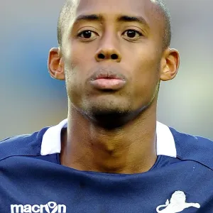 Millwall's Nadjim Abdou in Action: Npower Championship Showdown vs Peterborough United at The Den (2011-2012)