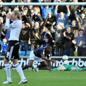 Millwall's Theo Robinson Scores Dramatic Diving Header Against Derby County in Championship Match at The New Den