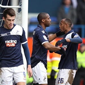 Millwall's Triumph: Guessan and Abdou Celebrate Third Goal vs. Luton Town in FA Cup Fifth Round