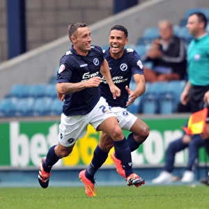 Scott McDonald Scores First Goal for Millwall: Jubilant Celebration with Team Mates against Blackpool in Sky Bet Championship Match