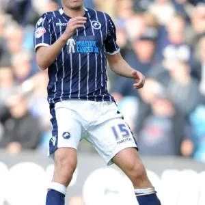 Sky Bet Championship Showdown: Millwall vs Queens Park Rangers - Paul Connolly's Action-Packed Performance at The New Den (19-10-2013)