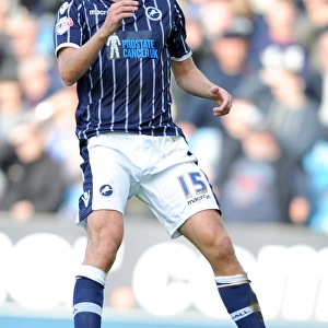 Sky Bet Championship Showdown: Millwall vs Queens Park Rangers - Paul Connolly's Action-Packed Performance at The New Den (19-10-2013)