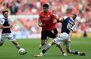 Images Dated 29th May 2016: Barnsley vs. Millwall - Intense Battle for the Ball in the Sky Bet League One Play-Off Final at
