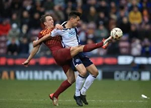 Images Dated 26th March 2016: Battle for the Ball: Tony McMahon vs. Joe Martin in Sky Bet League One Clash between Bradford City