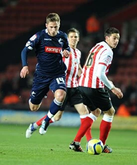 FA Cup - Round 4 Replay, 07-02-2012 v Southampton, St Mary's Stadium Collection: Battle for the FA Cup: Southampton vs. Millwall - Aaron Martin and James Henry Clash at St